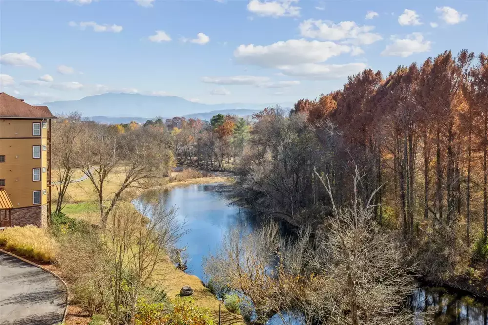 view of river and mountains with fall foliage from Sevierville condo balcony