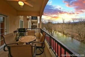 The deck of a condo overlooking the Little Pigeon River at Appleview River Resort in the Smoky Mountains.