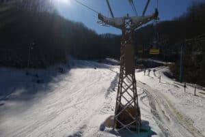 Ski lift and snowy slope at Ober Mountain